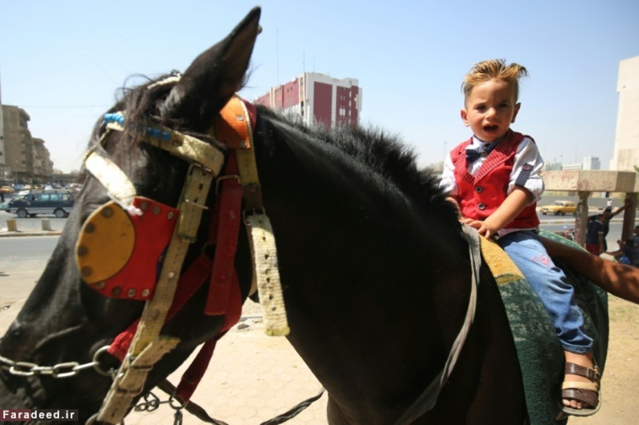 اسب‌سواری کودکی در بغداد